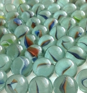 Picture of M84A 16MM Transparent Aqua colored marble with blue, orange, yellow, white cat eye glass marbles 